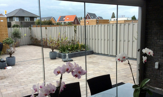 Schuifbare Veranda Tuinkamer - Schuifbare veranda met glazen schuifwanden.